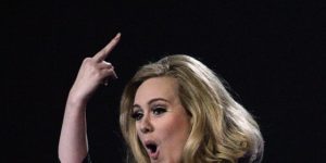 Adele collects her award for Album of the Year during the 2012 Brit awards at The O2 Arena, London.