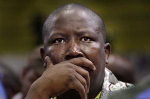 epa02912732 (FILE) A file photograph showing African National Congres (ANC) youth leaugue president Julius Malema attending the opening session of the ruling African National Congress (ANC)'s national general council in Durban, South Africa, 20 September 2010. Reports state on 12 September 2011 that following an Afrikaner civil rights group law suit against Julius Malema, the president of the ruling African National Congressâ×? (ANC) Youth League, after he sang the song, 'shoot the Boer,' at several events. The South African High Court ruled on 12 September 2011 that a song containing the words 'shoot the Boer' does constitute hate speech, and banned the ruling ANC from singing it.  EPA/JON HRUSA *** Local Caption *** 00000402346226
