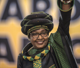The former wife of the late South African President Nelson Mandela, Winnie Mandela waves as she attends the 54th ANC National Conference at the NASREC Expo Centre in Johannesburg on December 16, 2017.
Thousands of delegates from South Africa's ANC party gathered on December 16, 2017 for a five-day meeting to elect their new leader in a divisive race seen as a pivotal moment in the country's post-apartheid history. he winner will be well placed to be the next president, but the ANC has lost much popularity since Nelson Mandela led it to power in the euphoric 1994 election that marked the end of white-minority rule.
/ AFP PHOTO / MUJAHID SAFODIEN (Photo credit should read MUJAHID SAFODIEN/AFP/Getty Images)